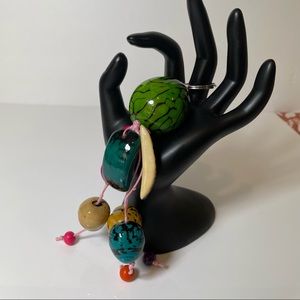 Handmade Keychain in Tagua Seed in various colors.